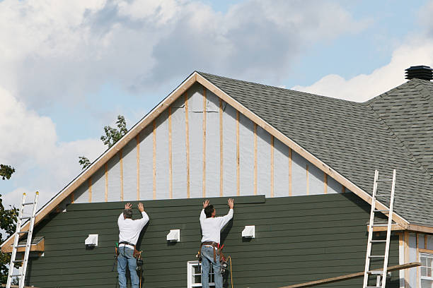 Professional Siding Installation technician working in Wampum, PA